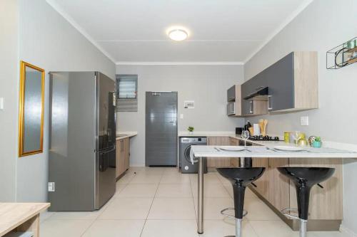 Dapur atau dapur kecil di Good Luck Homes - 2br Apartment