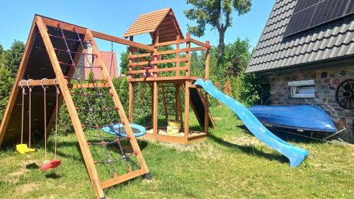 Herní místnost nebo prostor pro děti v ubytování Grygielówka nad jeziorem - sauna & jacuzzi