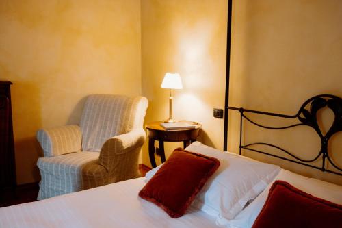 Ένα ή περισσότερα κρεβάτια σε δωμάτιο στο Hotel Casa Pavesi