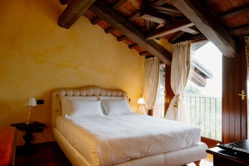 Ένα ή περισσότερα κρεβάτια σε δωμάτιο στο Hotel Casa Pavesi