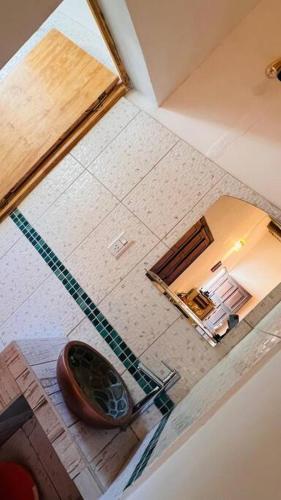 an overhead view of a bathroom with a fan at Cabaña la Viña in Purmamarca