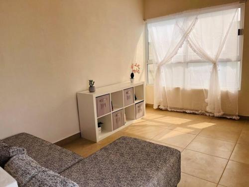 Postel nebo postele na pokoji v ubytování Dpto Penthouse con alberca