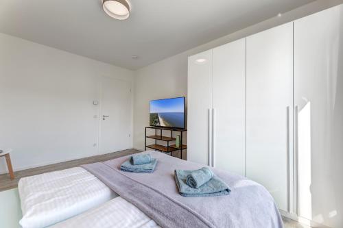 Ένα ή περισσότερα κρεβάτια σε δωμάτιο στο Apartment "Usedomer Luft"