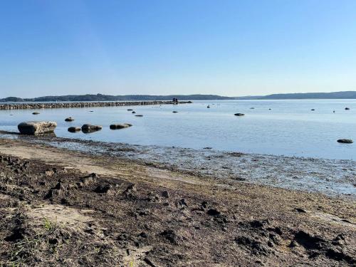 a large body of water with rocks in it at 4 person holiday home in ONSALA in Onsala