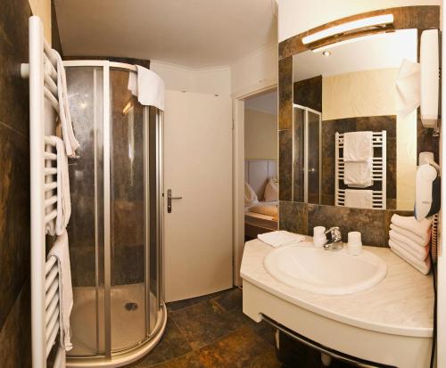 Koupelna v ubytování Smileys Kinderhotel