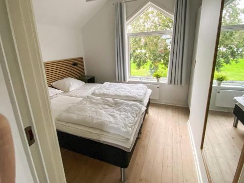 Postel nebo postele na pokoji v ubytování Holiday home Hadsund XXIII
