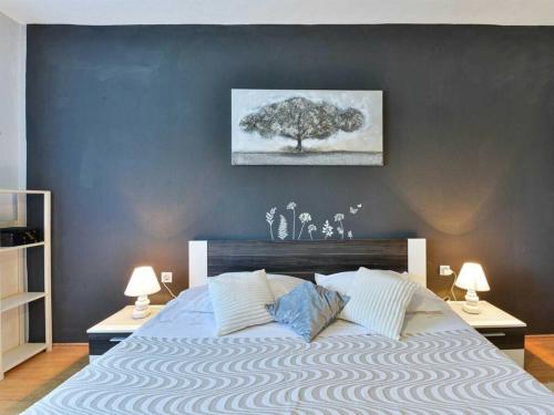 Postel nebo postele na pokoji v ubytování Meri Comfortable Holiday Residence