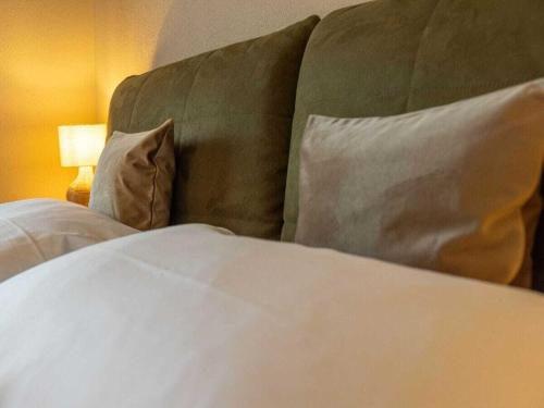 Ένα ή περισσότερα κρεβάτια σε δωμάτιο στο Melf 3 Comfortable holiday residence