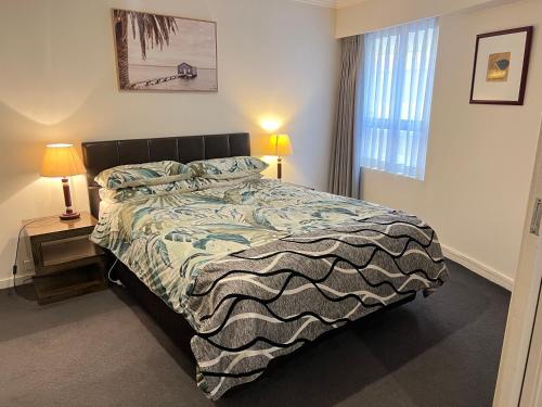 a bedroom with a bed and a window at Excellent location,Darling Harbour in Sydney