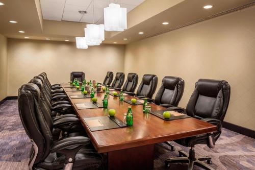 a conference room with a long table and chairs at Renaissance Phoenix Downtown Hotel in Phoenix