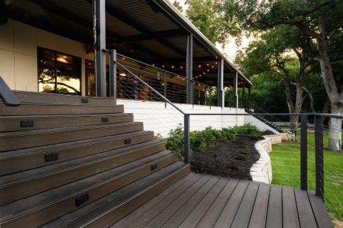 a set of stairs in front of a building at Courtyard by Marriott New Braunfels River Village in New Braunfels