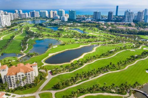 an aerial view of the resort with the city in the background at JW Marriott Miami Turnberry Resort & Spa in Aventura