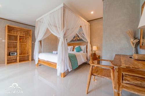 Ένα ή περισσότερα κρεβάτια σε δωμάτιο στο Meli Villa by Bukit Vista