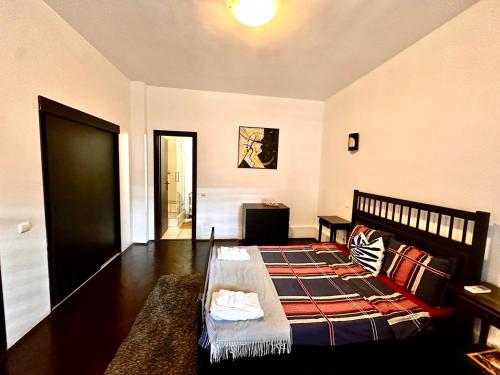 Postel nebo postele na pokoji v ubytování Conta Apartment