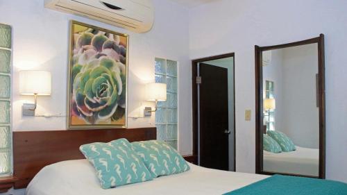 Llit o llits en una habitació de Serena Baja