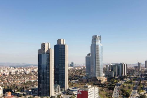 a group of tall buildings in a city at Sheraton Istanbul Levent in Istanbul