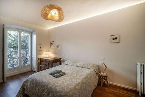 Ένα ή περισσότερα κρεβάτια σε δωμάτιο στο Casa Brac