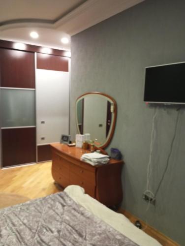 TV i/ili multimedijalni sistem u objektu Comfortable Room