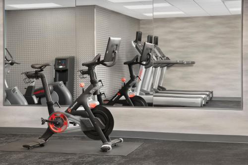 a gym with several exercise bikes in a room at Fairfield Inn & Suites Dulles Airport in Sterling
