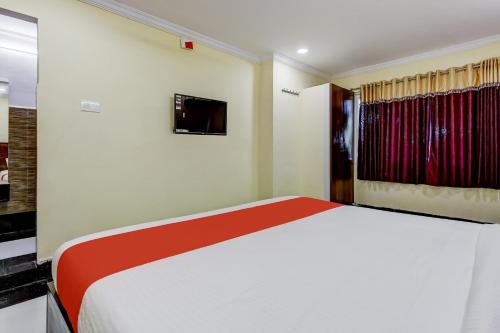 Katil atau katil-katil dalam bilik di Collection O Srinivasa Residency