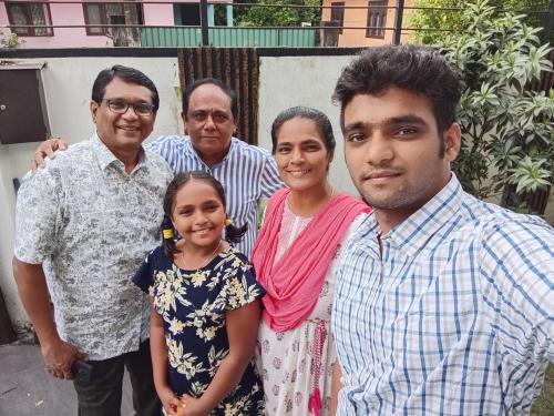 a group of people posing for a picture at Rohan's Residence in Kandana