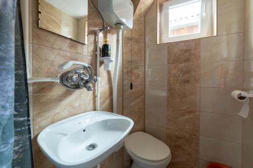 Koupelna v ubytování Apartmani LUFT