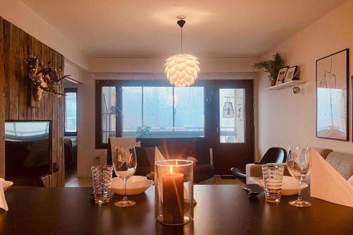 TV a/nebo společenská místnost v ubytování Aurora City penthouse