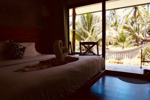 Postel nebo postele na pokoji v ubytování Suan Maprao Ko Kut Resort