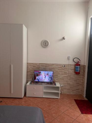 TV a/nebo společenská místnost v ubytování Il rifugio Comoda e accogliente Casetta