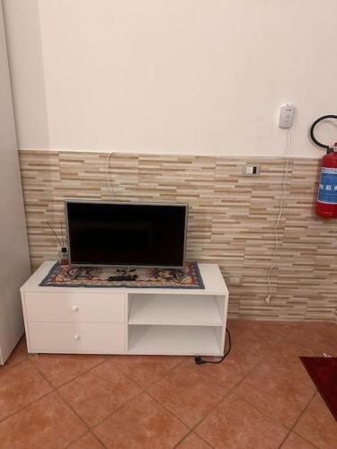 TV a/nebo společenská místnost v ubytování Il rifugio Comoda e accogliente Casetta