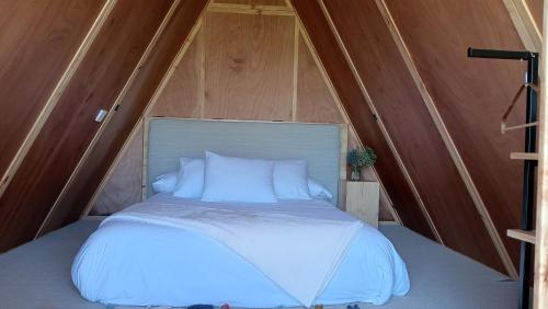 a bedroom with a bed in a tent at Camping Costa da Morte in Zas
