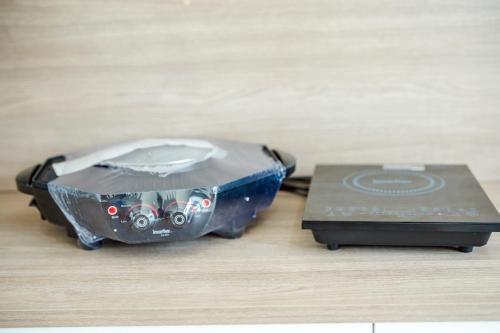 a electronic device sitting on top of a table at come home pool villa cha-am in Phetchaburi