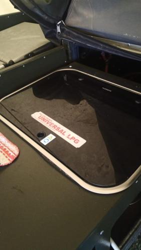 an open oven with a sticker on the door at Isikhoma-Khoma in Hilton