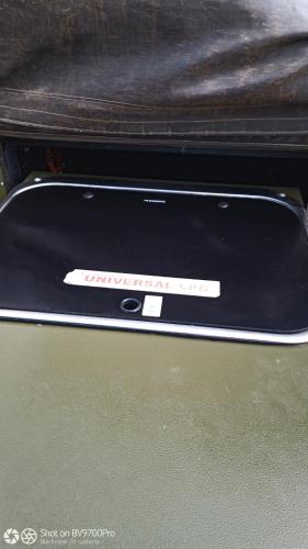 a cell phone sitting on top of a table at Isikhoma-Khoma in Hilton