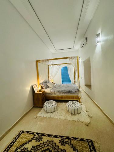 Riad Kasbah Ben Hamoにあるベッド
