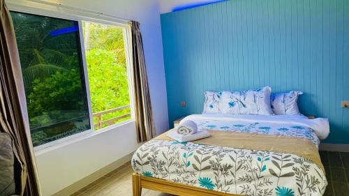 Ein Bett oder Betten in einem Zimmer der Unterkunft Wave Crest Retreat