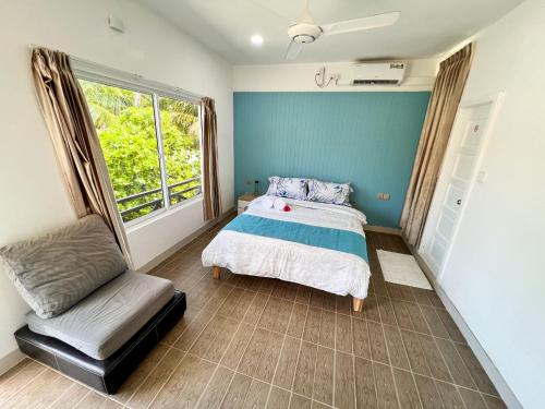 Ein Bett oder Betten in einem Zimmer der Unterkunft Wave Crest Retreat