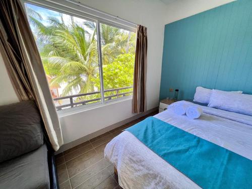Ein Bett oder Betten in einem Zimmer der Unterkunft Wave Crest Retreat