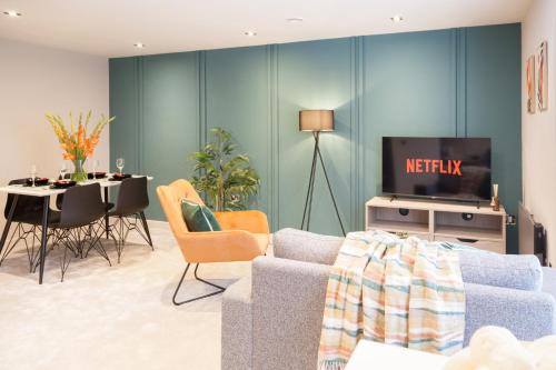 Μια τηλεόραση ή/και κέντρο ψυχαγωγίας στο Somers Suites Apartments