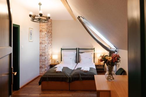 Postel nebo postele na pokoji v ubytování Dom Potok