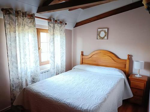 Postel nebo postele na pokoji v ubytování Casa rural La Corona