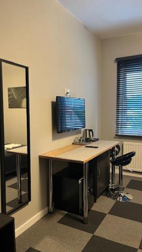 Μια τηλεόραση ή/και κέντρο ψυχαγωγίας στο Apartamenty Marciniak