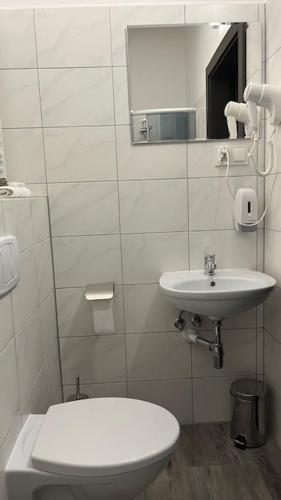 Ένα μπάνιο στο Apartamenty Marciniak