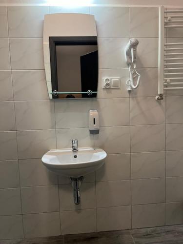 Ένα μπάνιο στο Apartamenty Marciniak