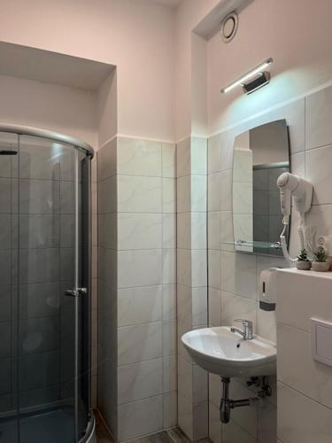Ένα μπάνιο στο Apartamenty Marciniak