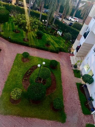 an overhead view of a garden with bushes and trees at The hidden oasis, steps from the beach and pool in Mohammedia