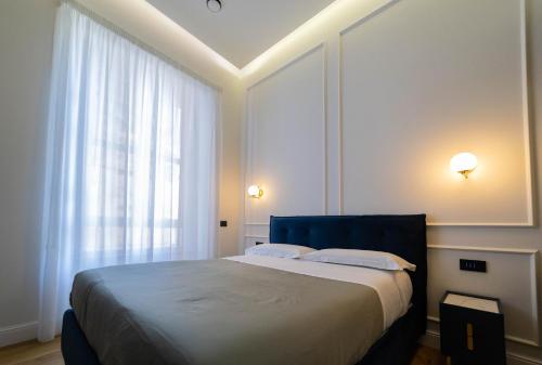 Postel nebo postele na pokoji v ubytování Bed and Breakfast SirenaResina