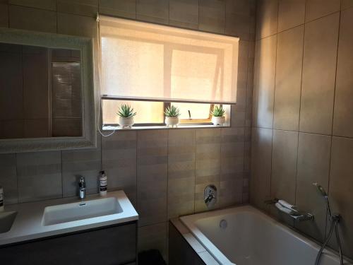 Vannituba majutusasutuses Sunrock Guesthouse