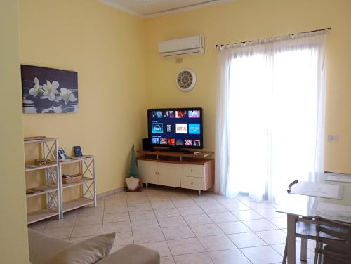 TV a/nebo společenská místnost v ubytování A CASA DI STÈ - Vicino aeroporto Falcone Borsellino