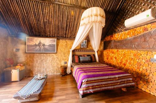 Ένα ή περισσότερα κρεβάτια σε δωμάτιο στο Homestay Ako Ea